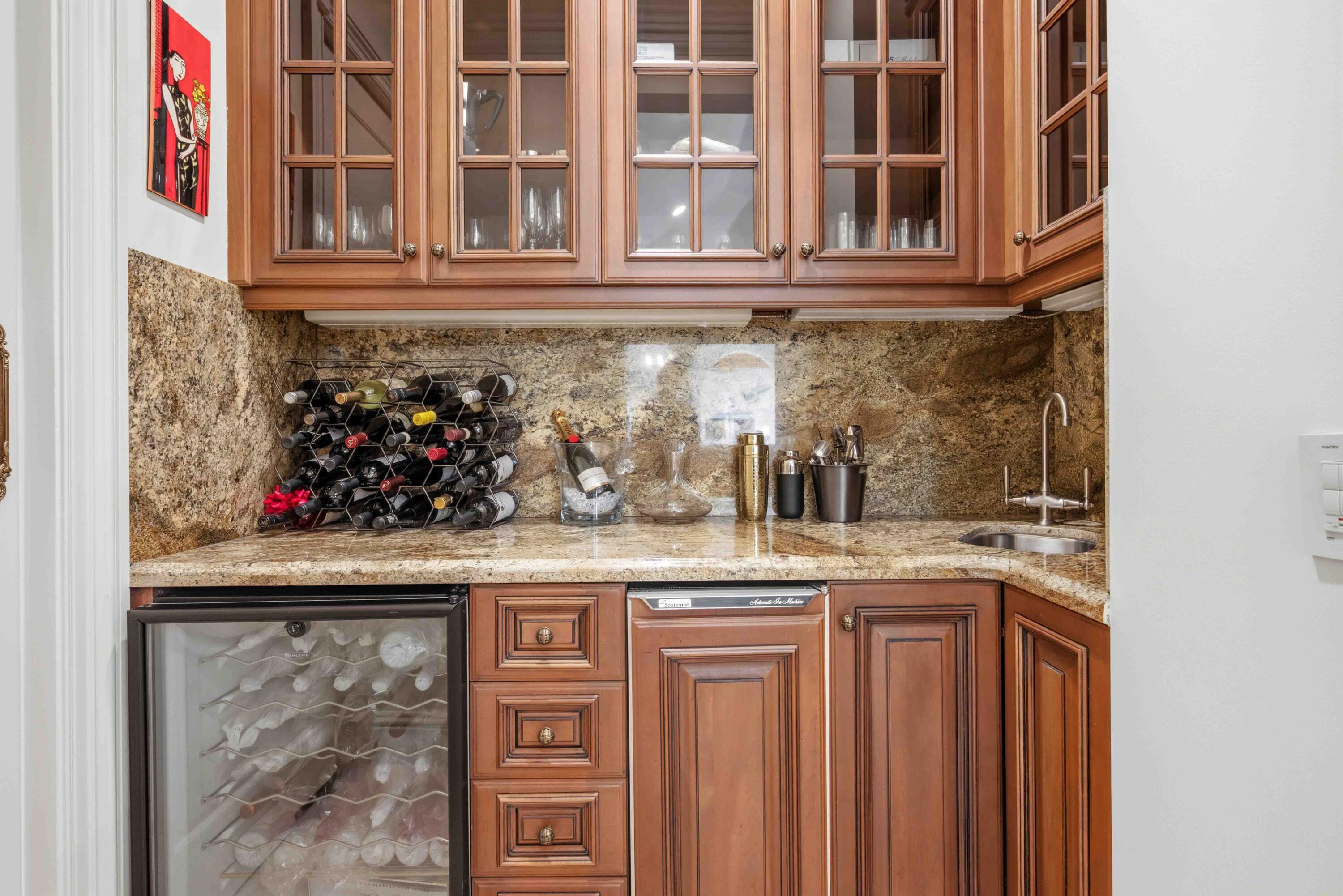 18118 Daybreak Drive Boca Raton, FL 33496 - Photo 23 of 84 a kitchen with stainless steel appliances granite countertop a sink and cabinets