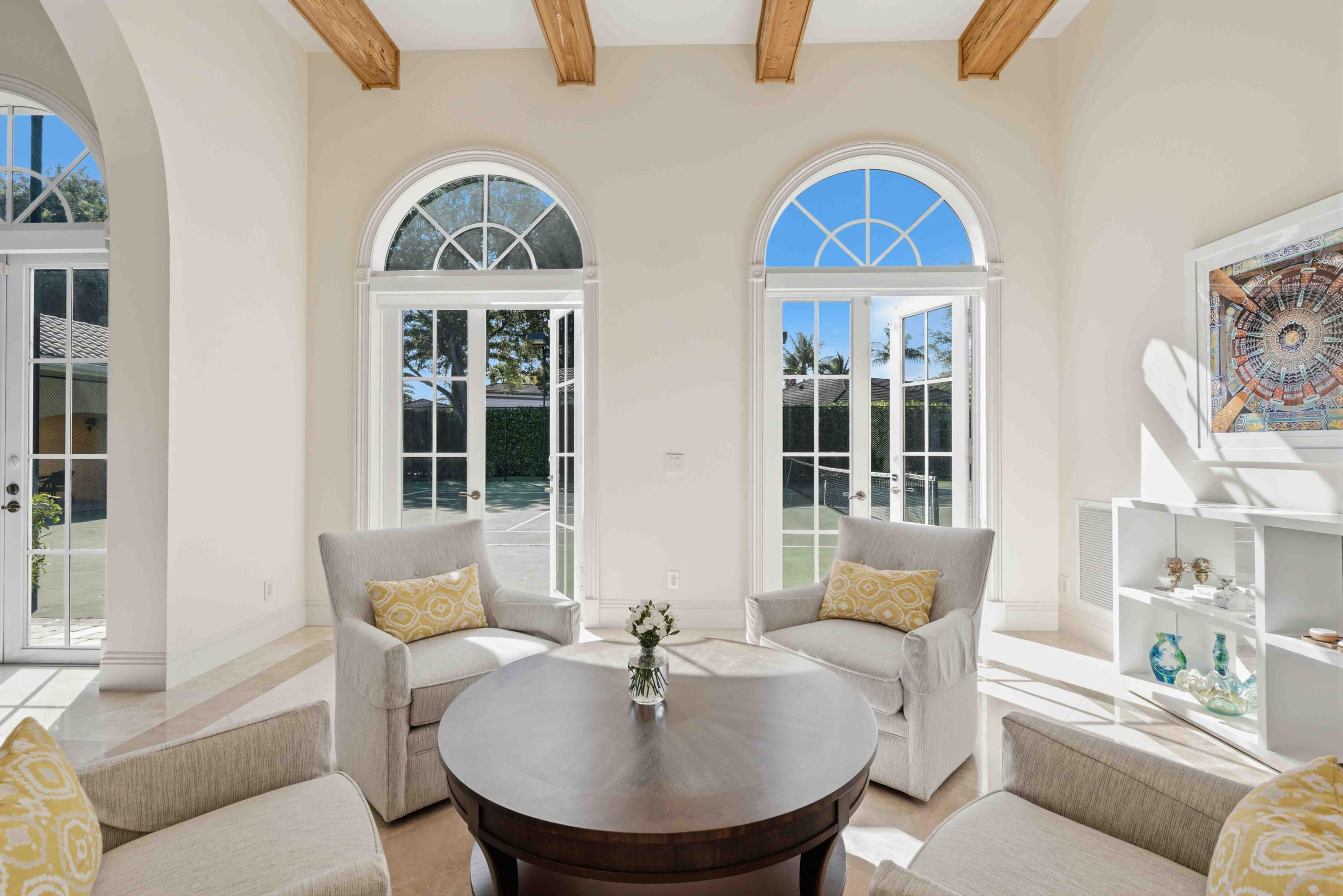 18118 Daybreak Drive Boca Raton, FL 33496 - Photo 35 of 84 a living room with furniture and a window