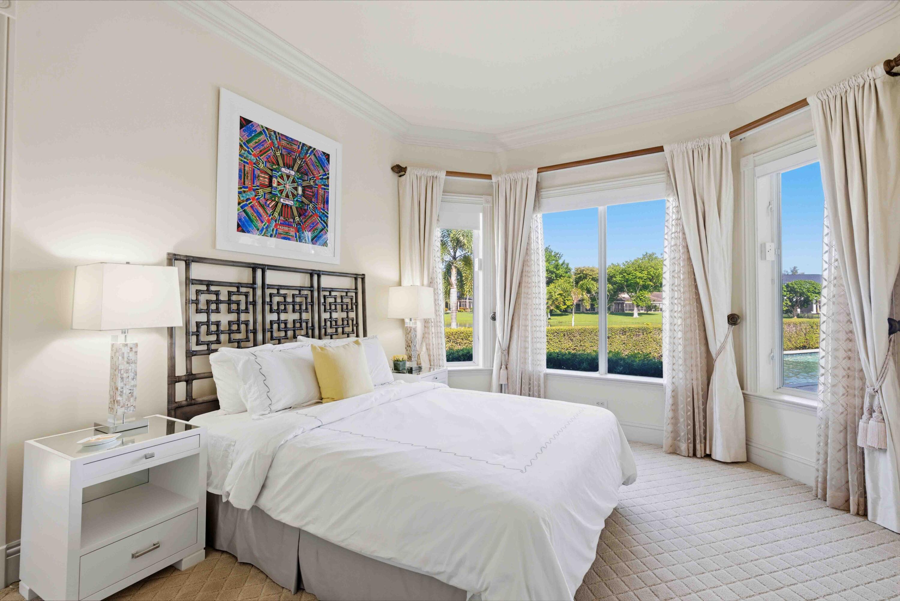 18118 Daybreak Drive Boca Raton, FL 33496 - Photo 37 of 84 a bedroom with a large bed and a large window