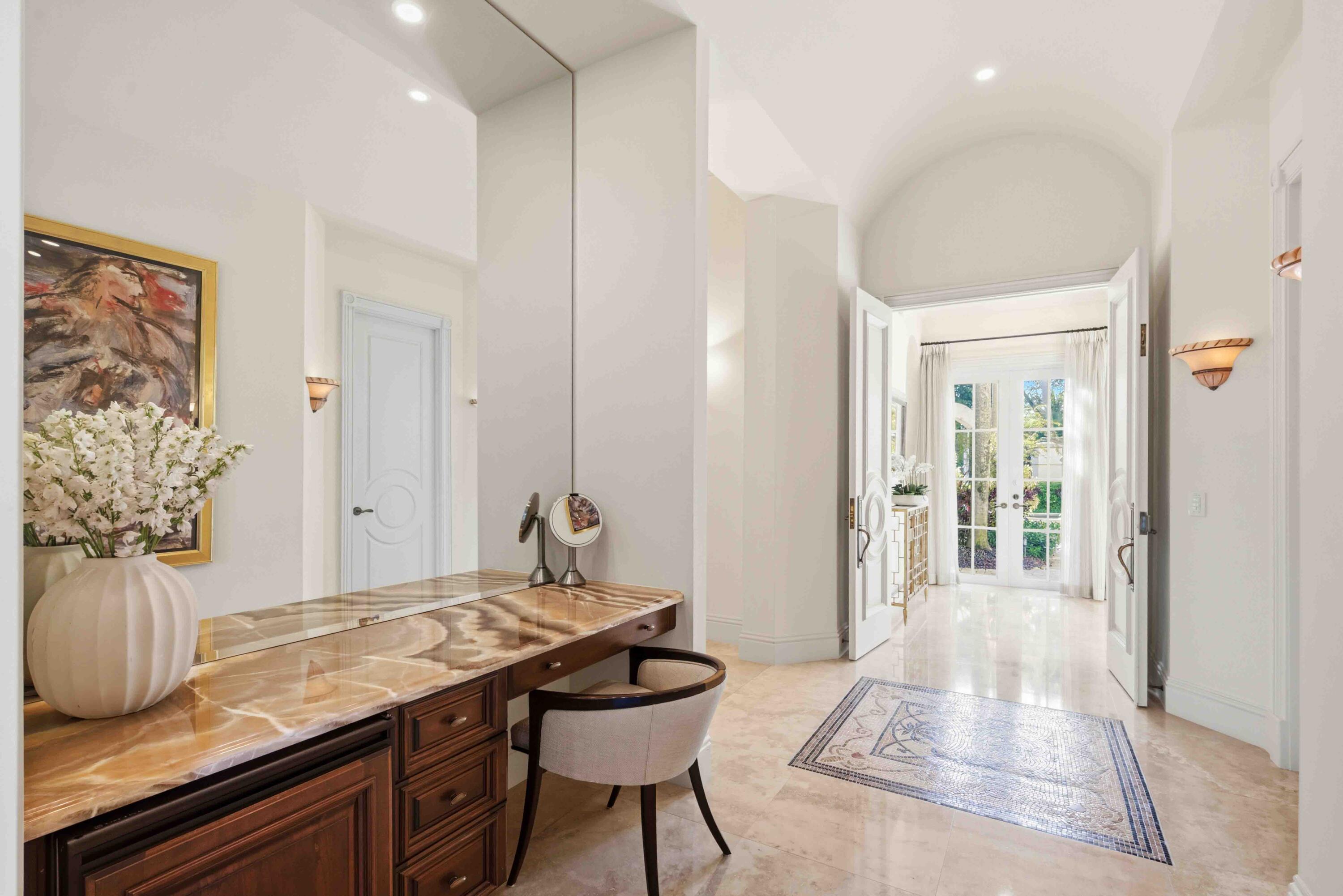 18118 Daybreak Drive Boca Raton, FL 33496 - Photo 40 of 84 a view of a kitchen area with furniture and wooden floor