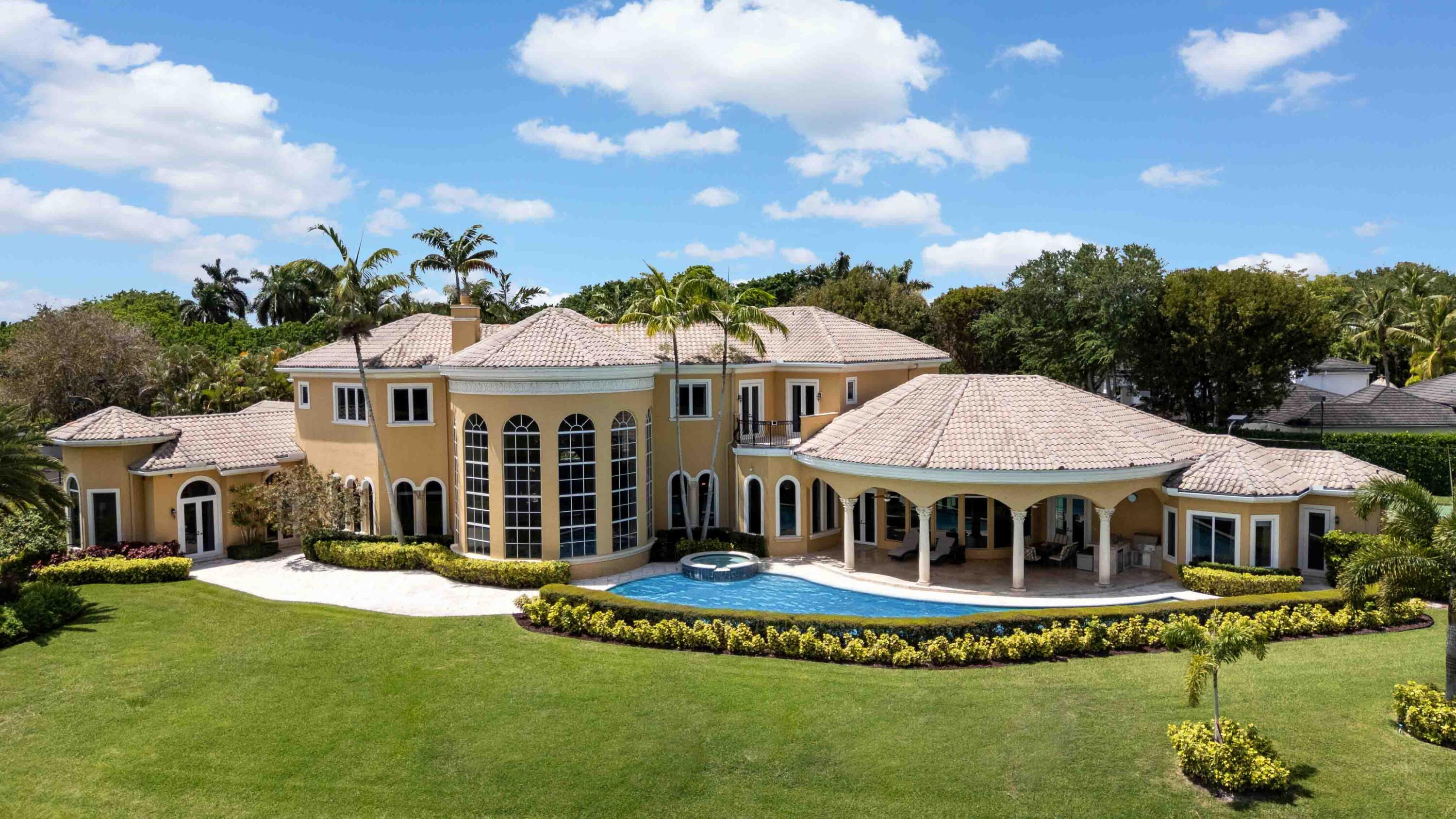 18118 Daybreak Drive Boca Raton, FL 33496 - Photo 5 of 84 a front view of a house with a garden