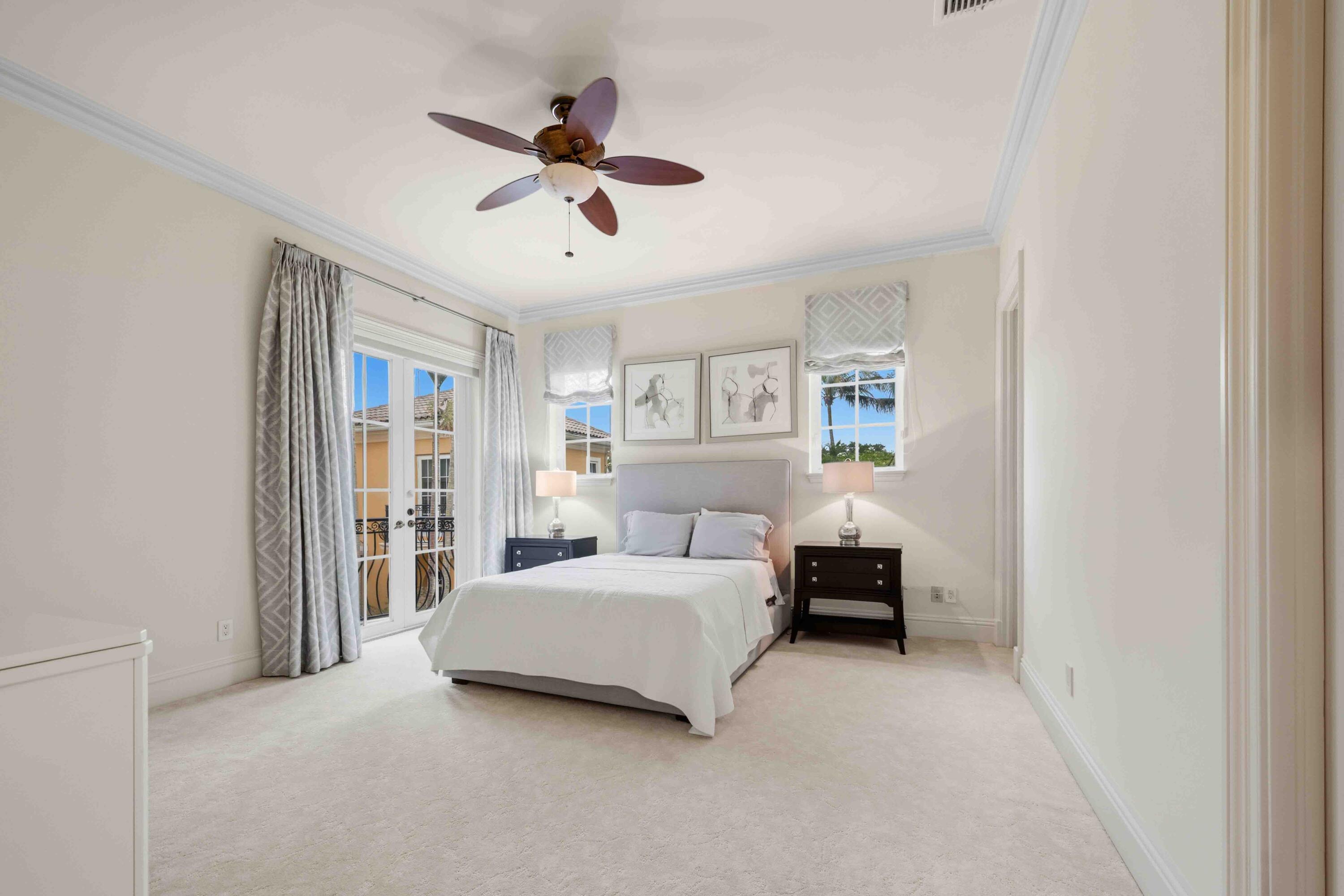 18118 Daybreak Drive Boca Raton, FL 33496 - Photo 54 of 84 a living room with a bed furniture and a window