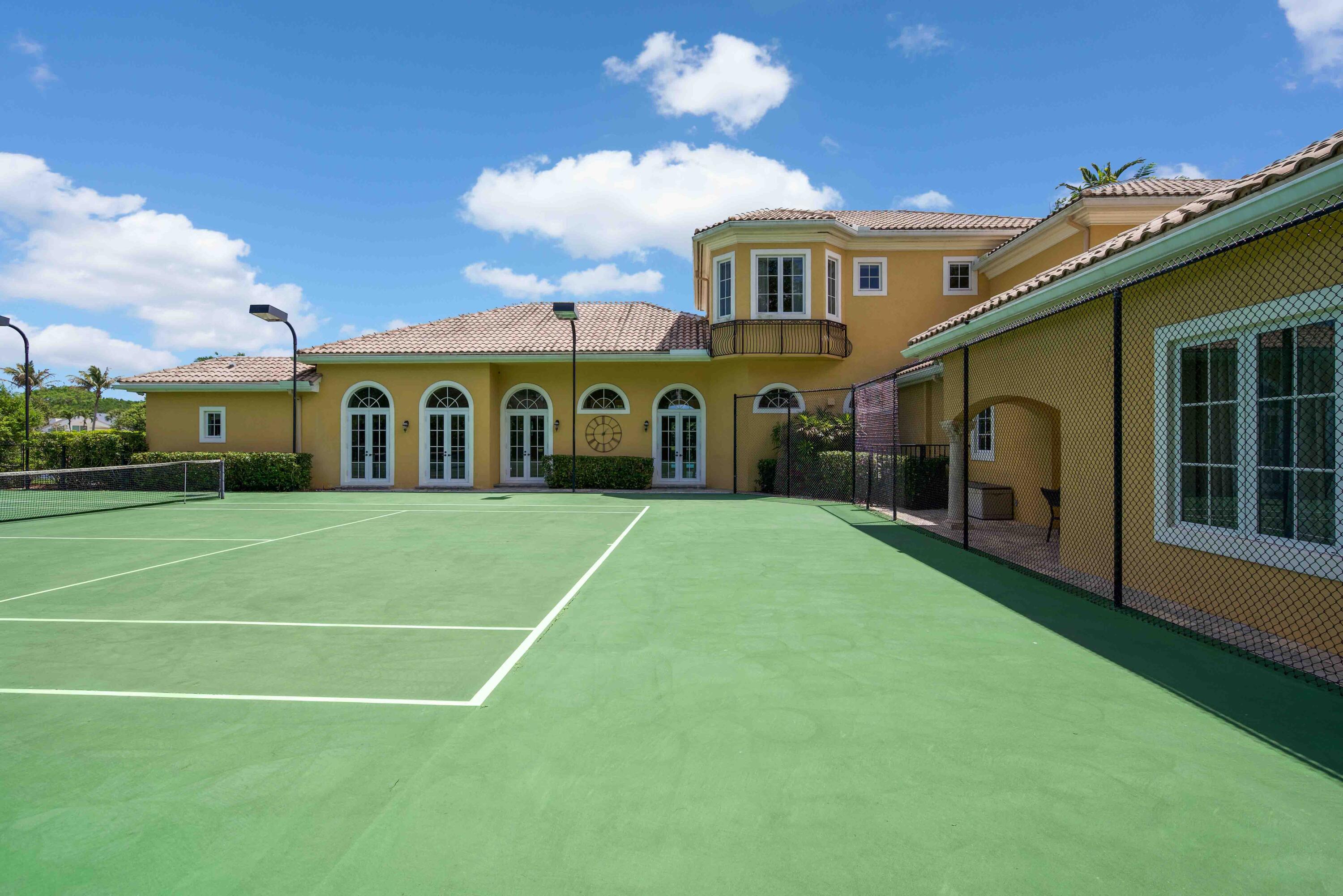18118 Daybreak Drive Boca Raton, FL 33496 - Photo 67 of 84 a view of a house with a backyard and porch
