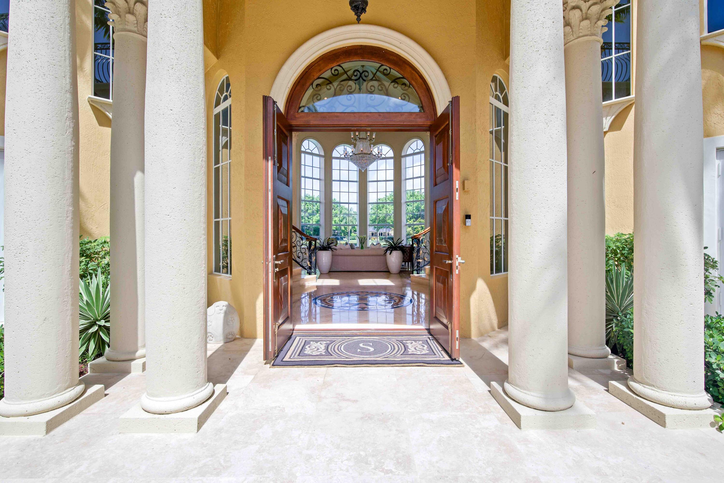 18118 Daybreak Drive Boca Raton, FL 33496 - Photo 10 of 84 a view of a entryway door of the house