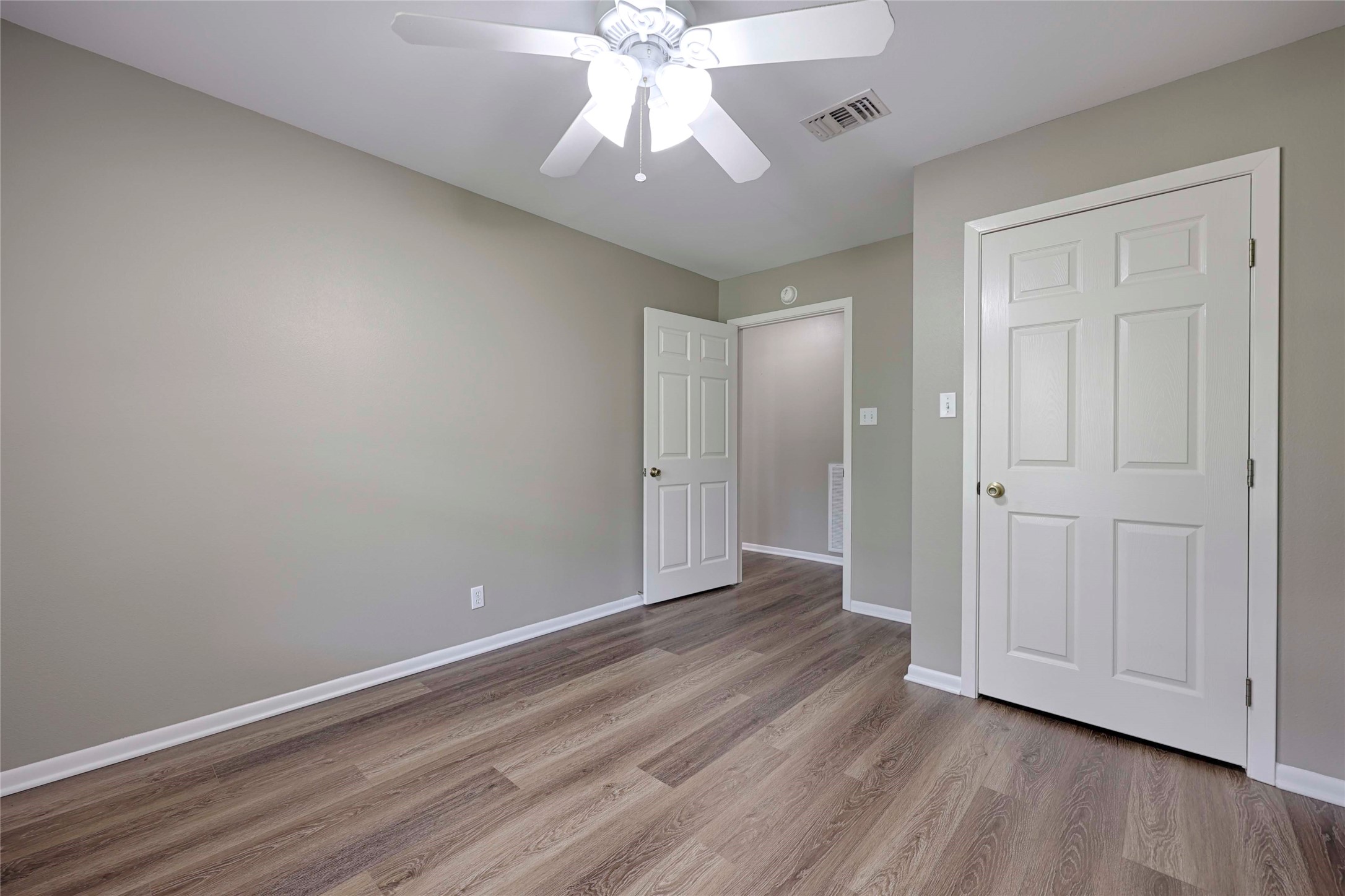 3545 East I- 10 Frontage Road Schulenburg, TX 78956 - Photo 21 of 40 a view of an empty room with window chandelier fan