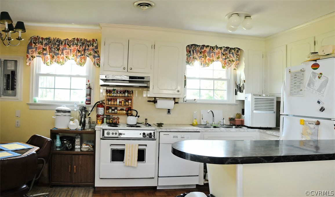 319 Beaumar Road Moon, VA 23119 - Photo 13 of 24 a kitchen with a sink stove and window