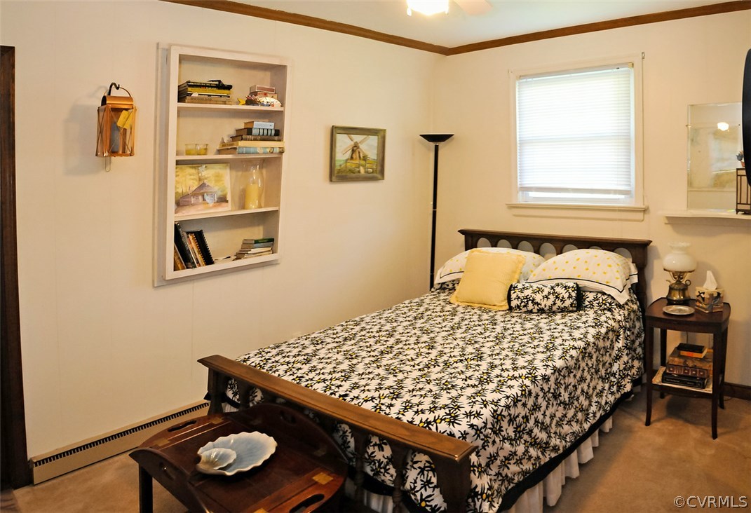 319 Beaumar Road Moon, VA 23119 - Photo 18 of 24 a bedroom with a bed and a window