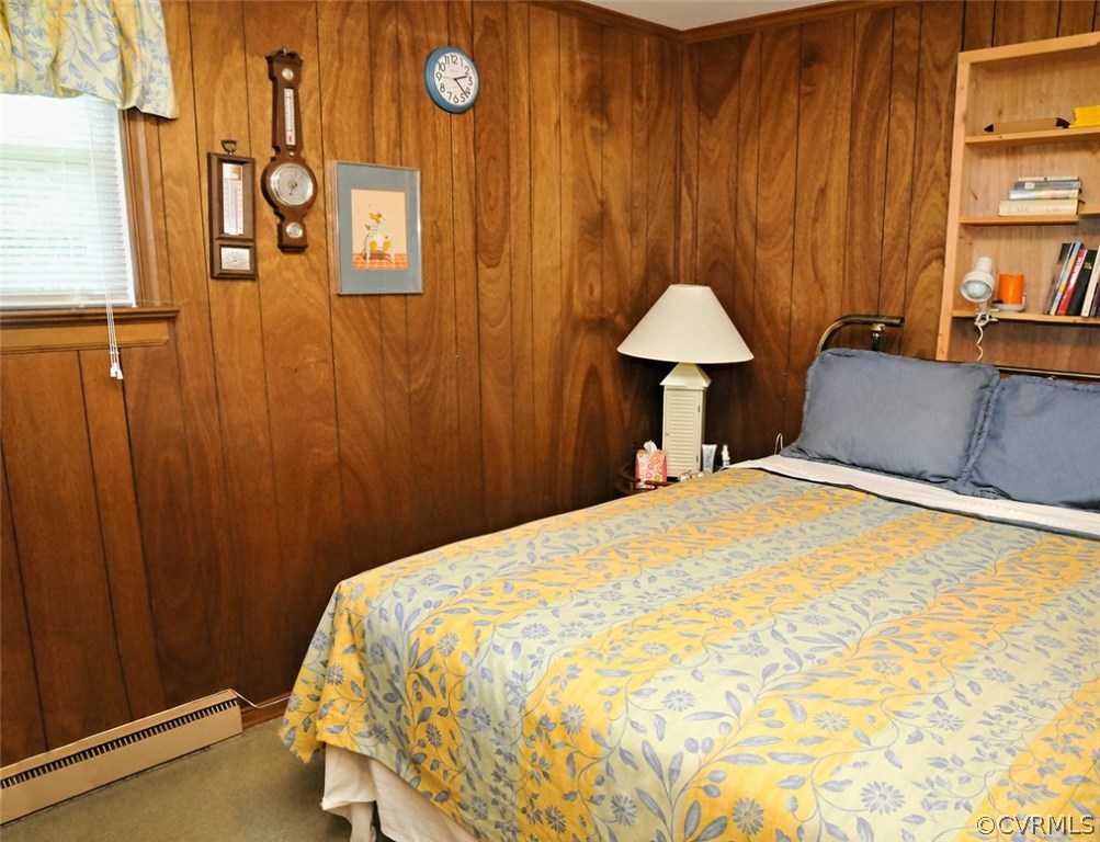 319 Beaumar Road Moon, VA 23119 - Photo 19 of 24 a bedroom with a bed and a table