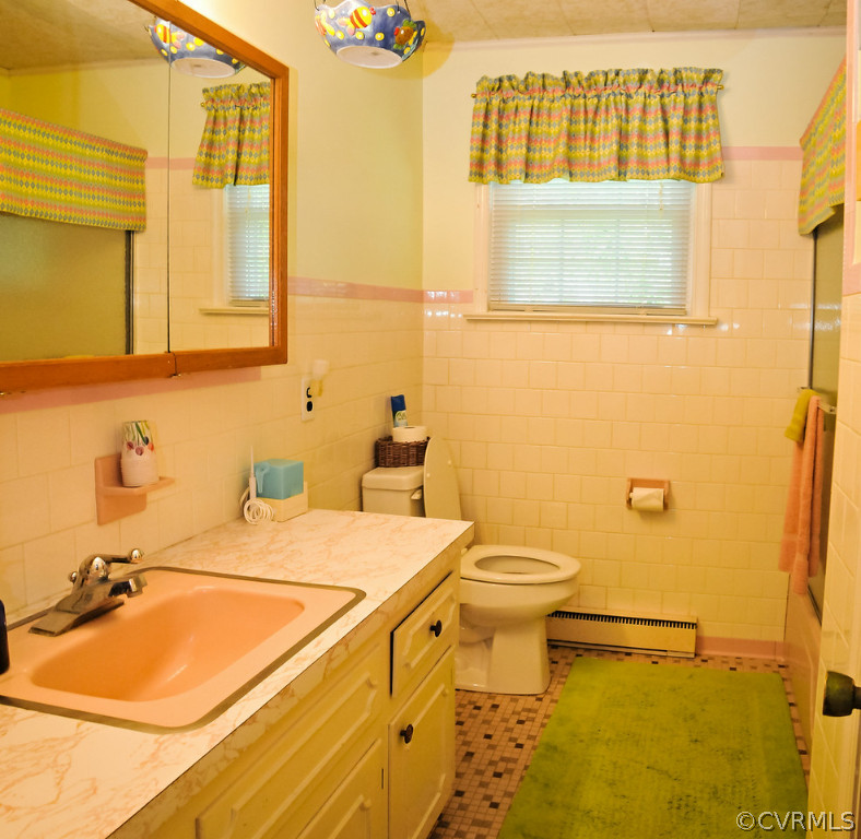 319 Beaumar Road Moon, VA 23119 - Photo 20 of 24 a bathroom with a sink a toilet and a mirror