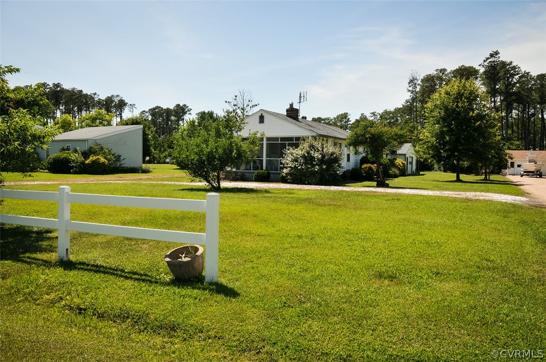 319 Beaumar Road Moon, VA 23119 - Photo 22 of 24 a view of a house with a big yard