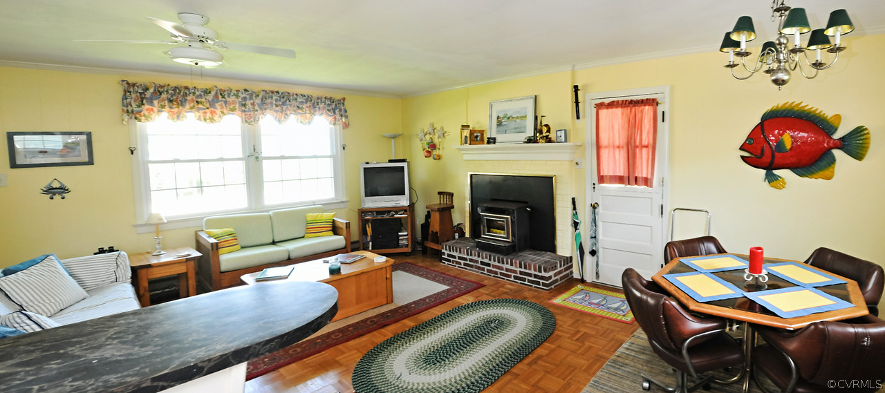 319 Beaumar Road Moon, VA 23119 - Photo 10 of 24 a living room with furniture fireplace and window