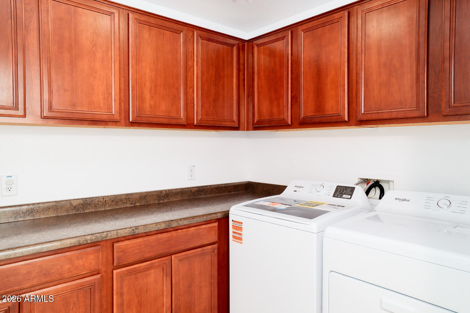 21619 West Durango Street Buckeye, AZ 85326 - Photo 15 of 30 a utility room with dryer and washer