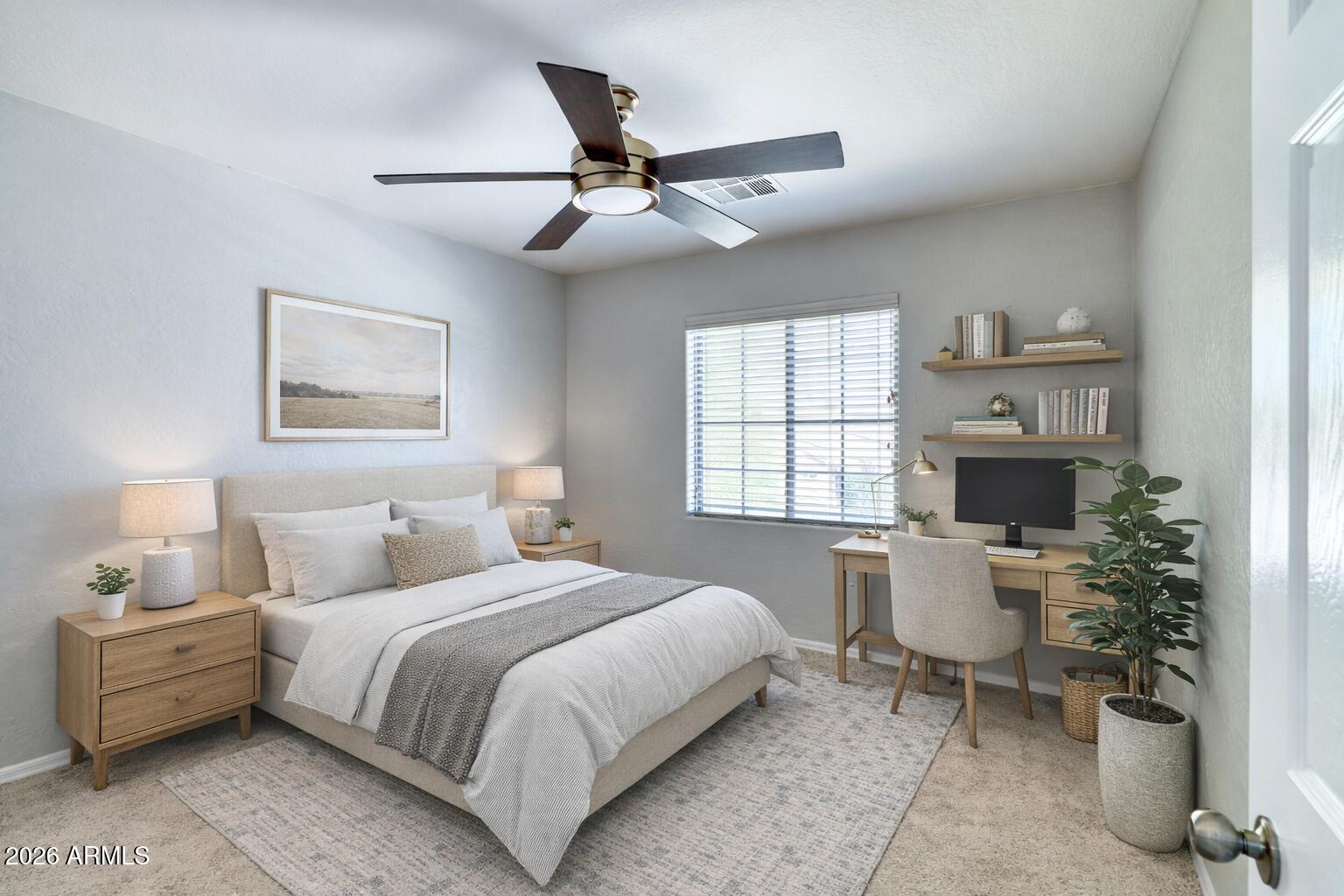 21619 West Durango Street Buckeye, AZ 85326 - Photo 21 of 30 a bedroom with a large bed and windows