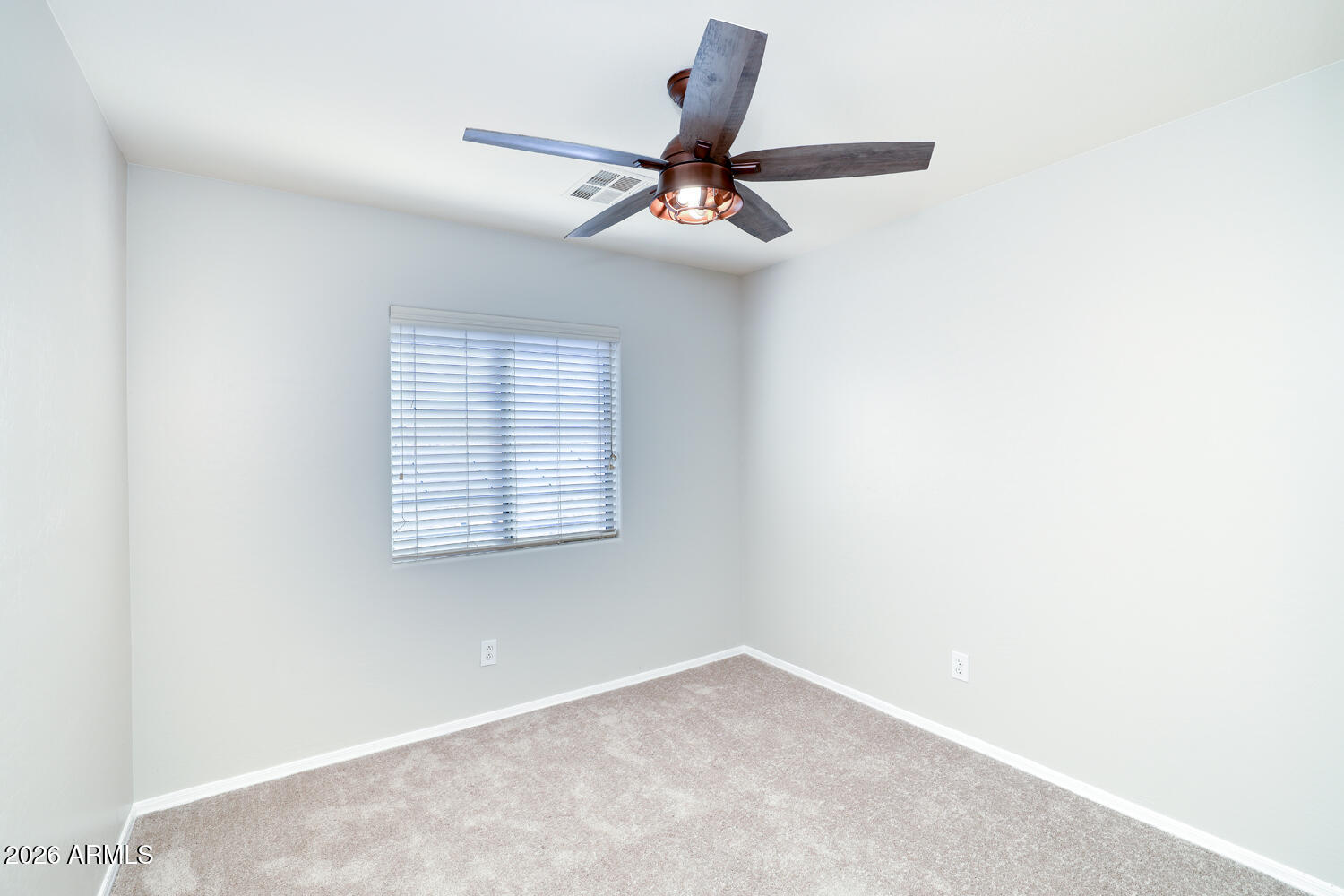21619 West Durango Street Buckeye, AZ 85326 - Photo 28 of 30 an empty room with a window