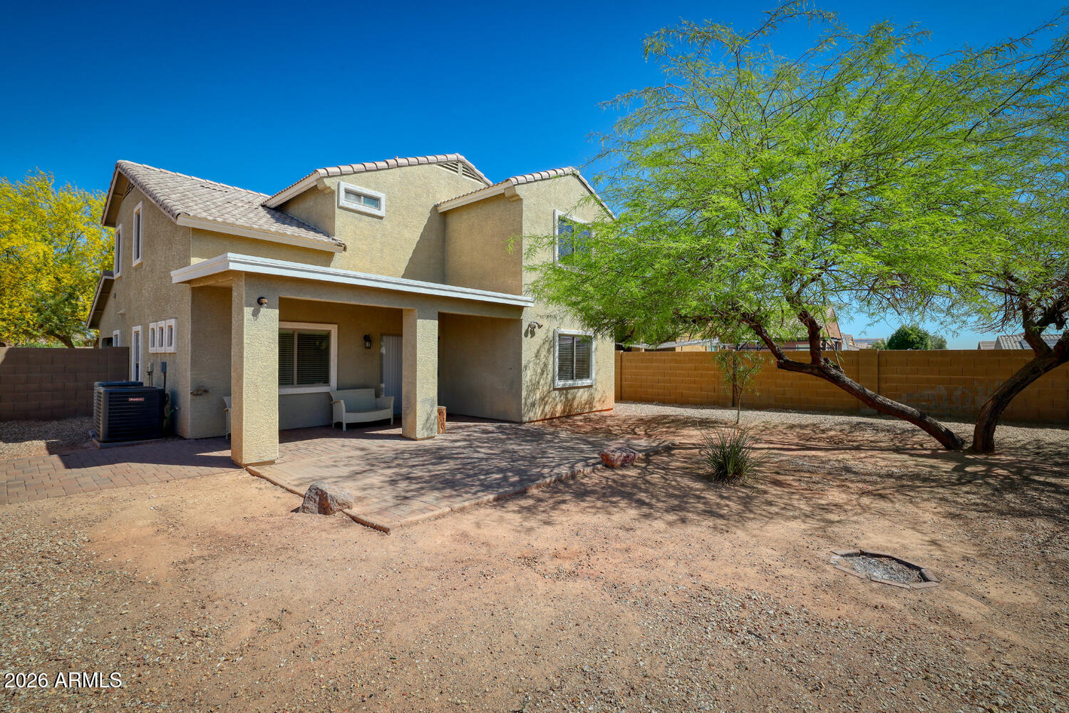 21619 West Durango Street Buckeye, AZ 85326 - Photo 30 of 30 a view of a house with a yard and sitting area