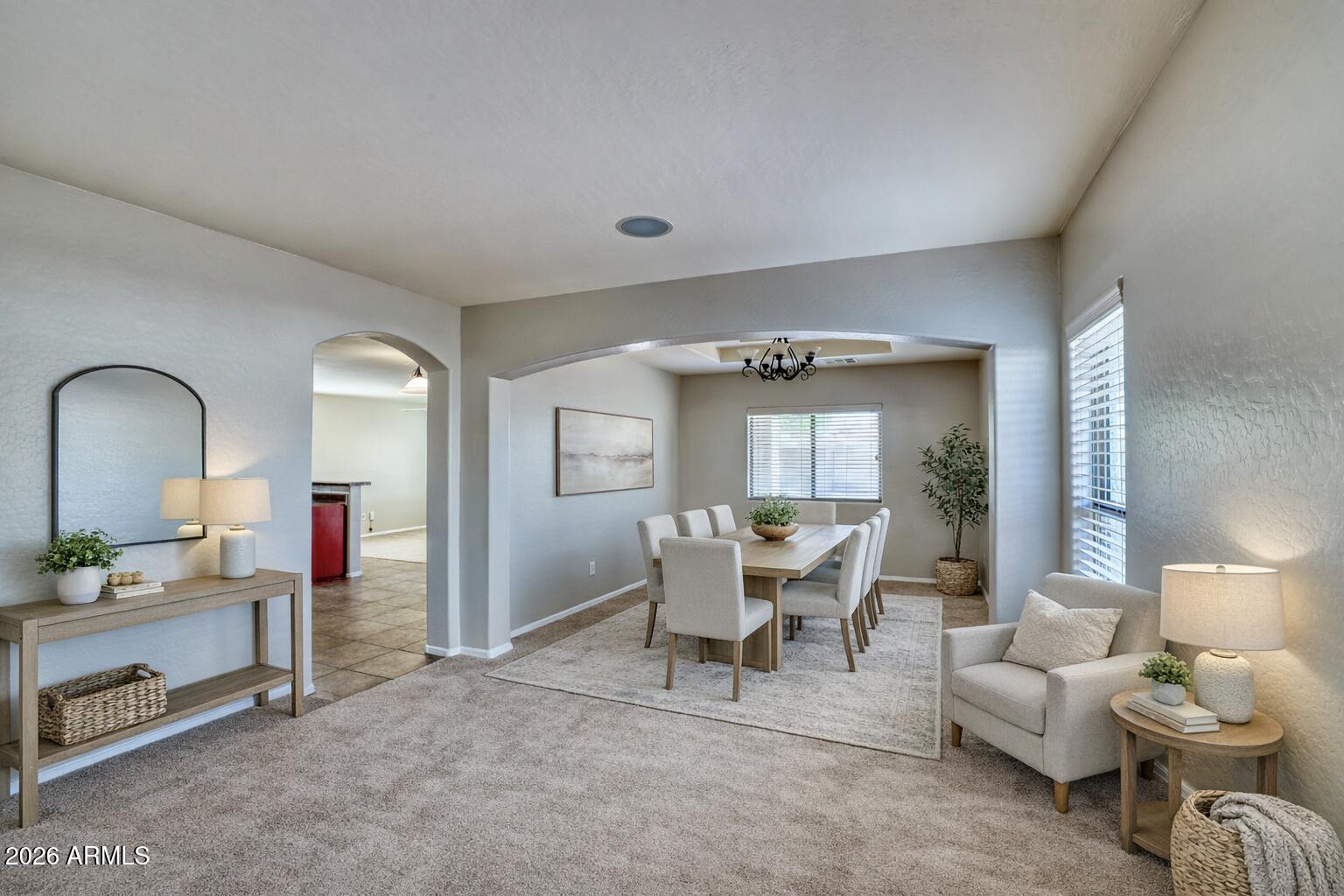 21619 West Durango Street Buckeye, AZ 85326 - Photo 4 of 30 a living room with furniture and a wooden floor