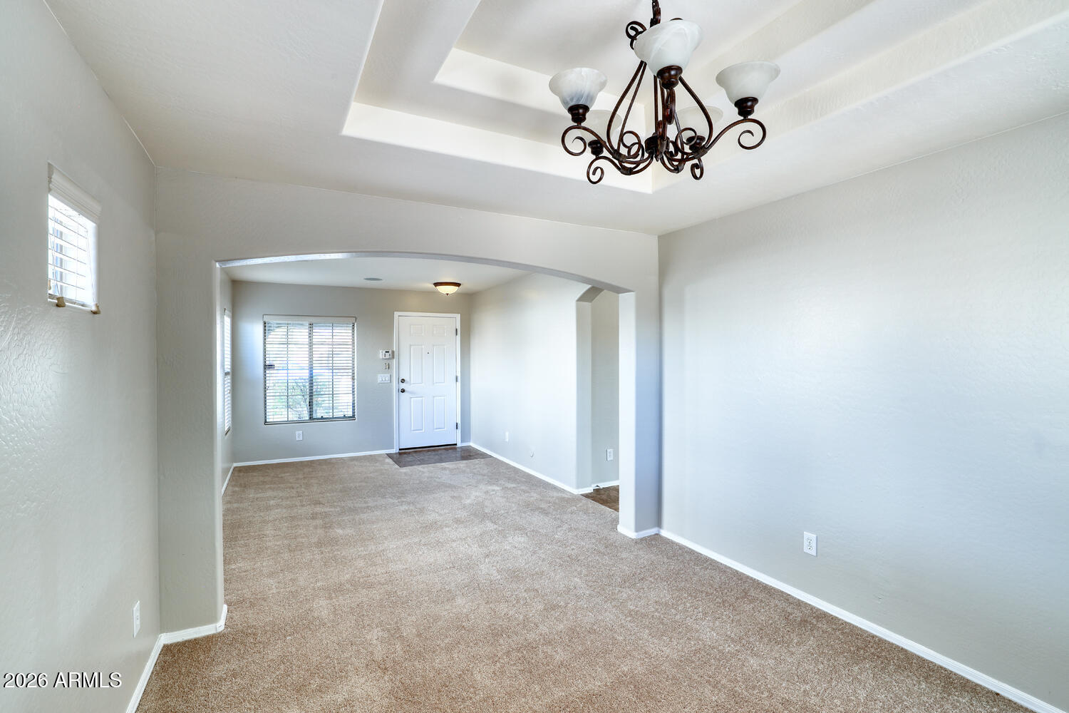 21619 West Durango Street Buckeye, AZ 85326 - Photo 7 of 30 a view of an empty room with a window
