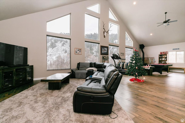 7203 East Cub River Road Preston, ID 83263 - Photo 8 of 33 Living room featuring a high ceiling, wood finished floors, ceiling fan, recessed lighting, and pool table