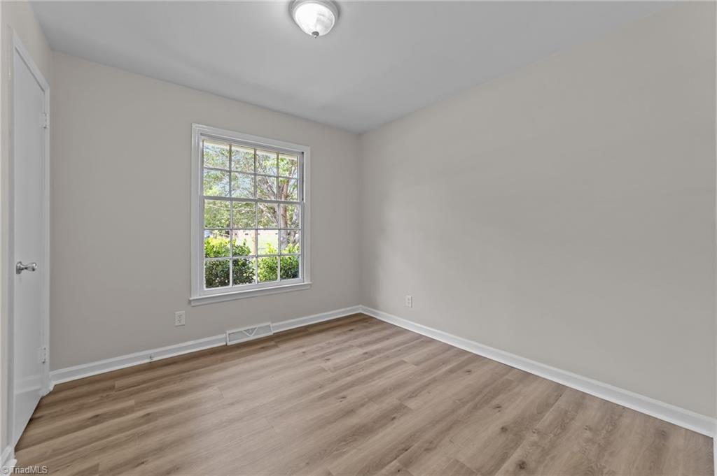 2507 Fontaine Road Greensboro, NC 27407 - Photo 12 of 34 Third bedroom with closet space.