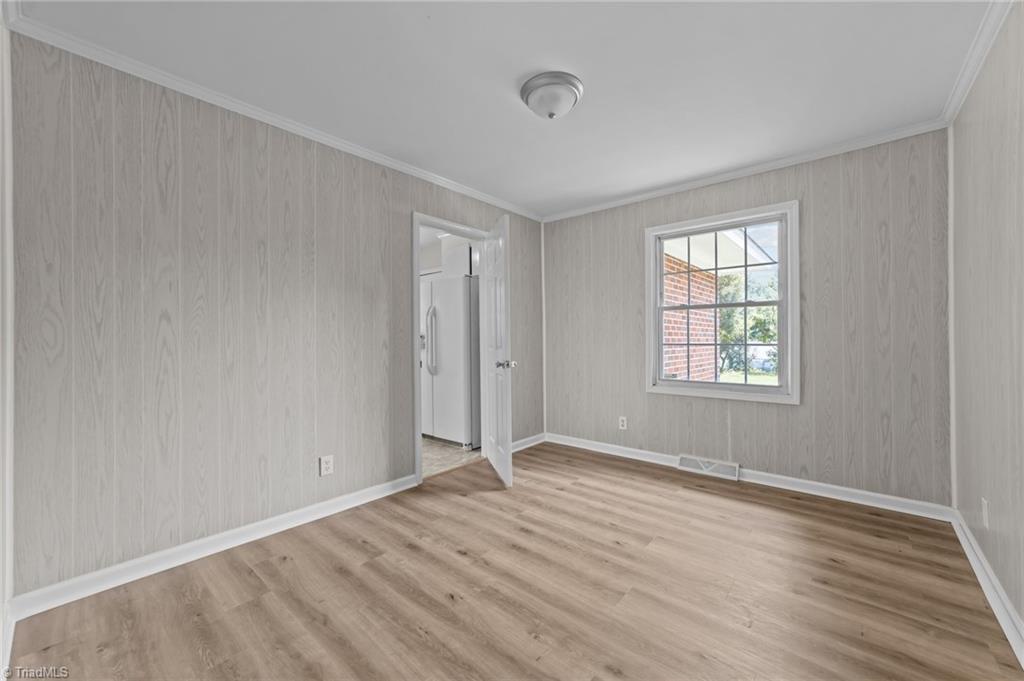 2507 Fontaine Road Greensboro, NC 27407 - Photo 18 of 34 Dining room or flexible bedroom with easy access to the kitchen.