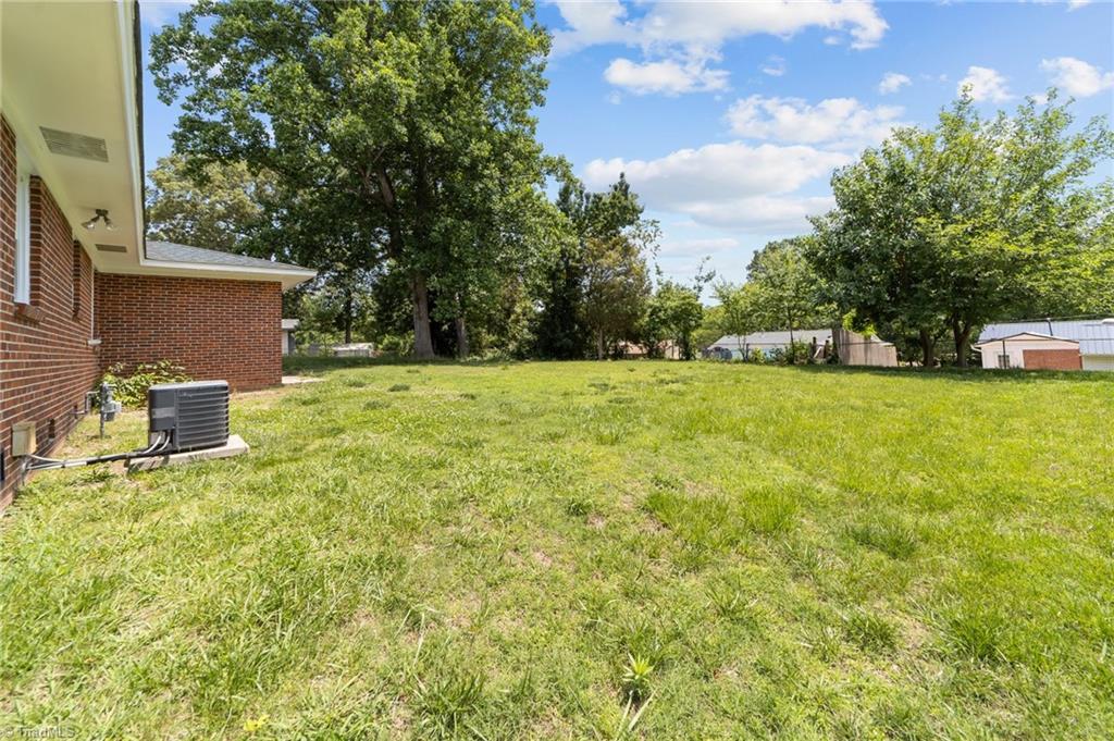 2507 Fontaine Road Greensboro, NC 27407 - Photo 27 of 34 The huge backyard.