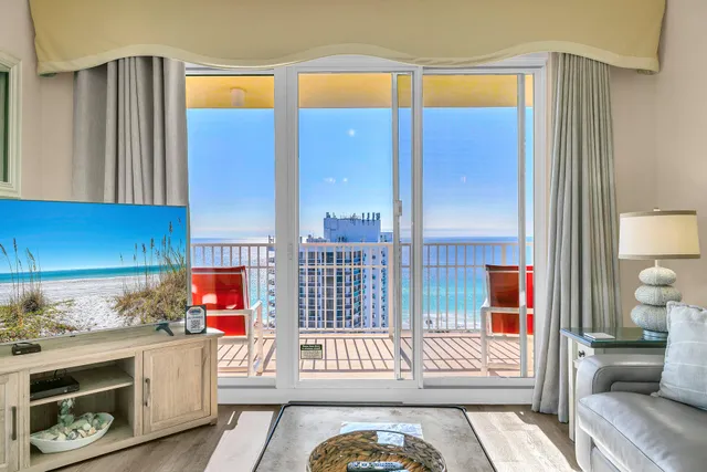 a kitchen with a refrigerator and a stove top oven