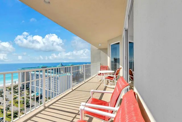 a view of a balcony with wooden floor