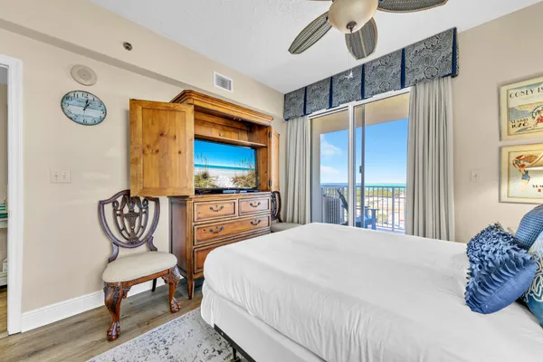 a bedroom with a bed and furniture