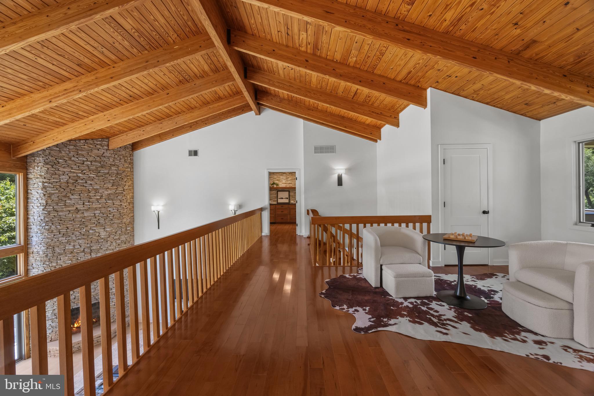 917 Childs Point Road Annapolis, MD 21401 - Photo 22 of 40 Upper level catwalk with sitting area