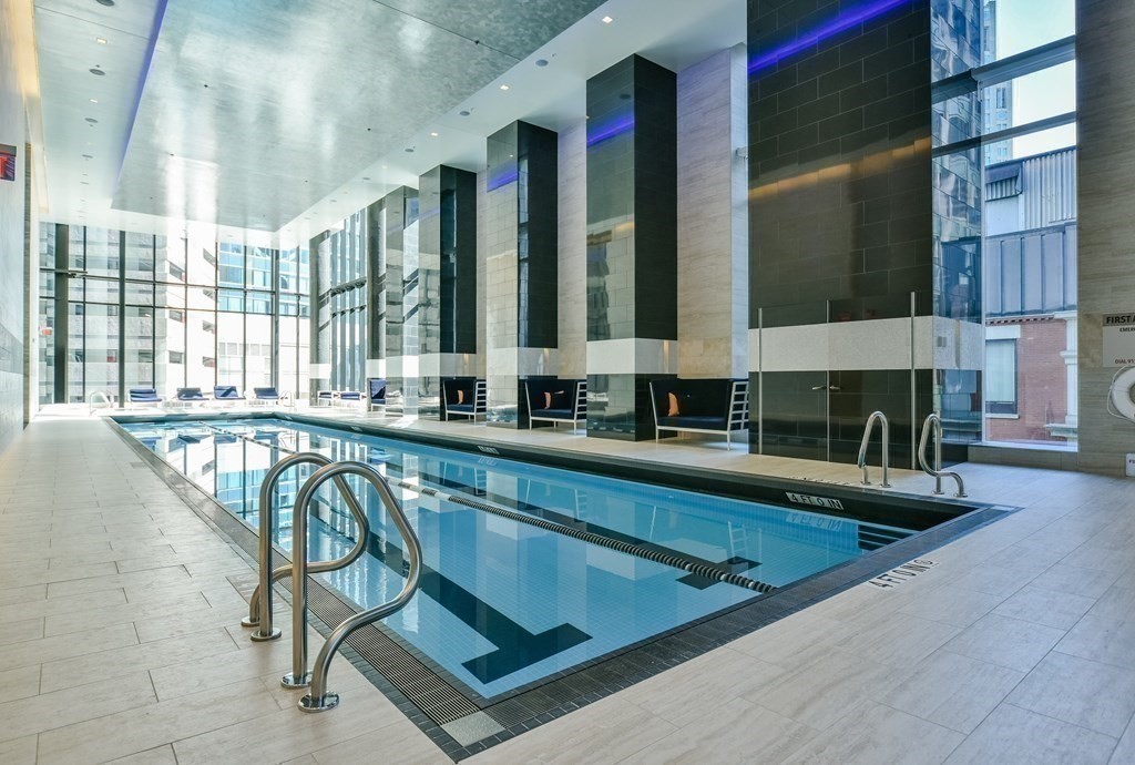 1 Franklin Street, Unit 4204 Boston, MA 02110 - Photo 27 of 37 a view of swimming pool with outdoor seating