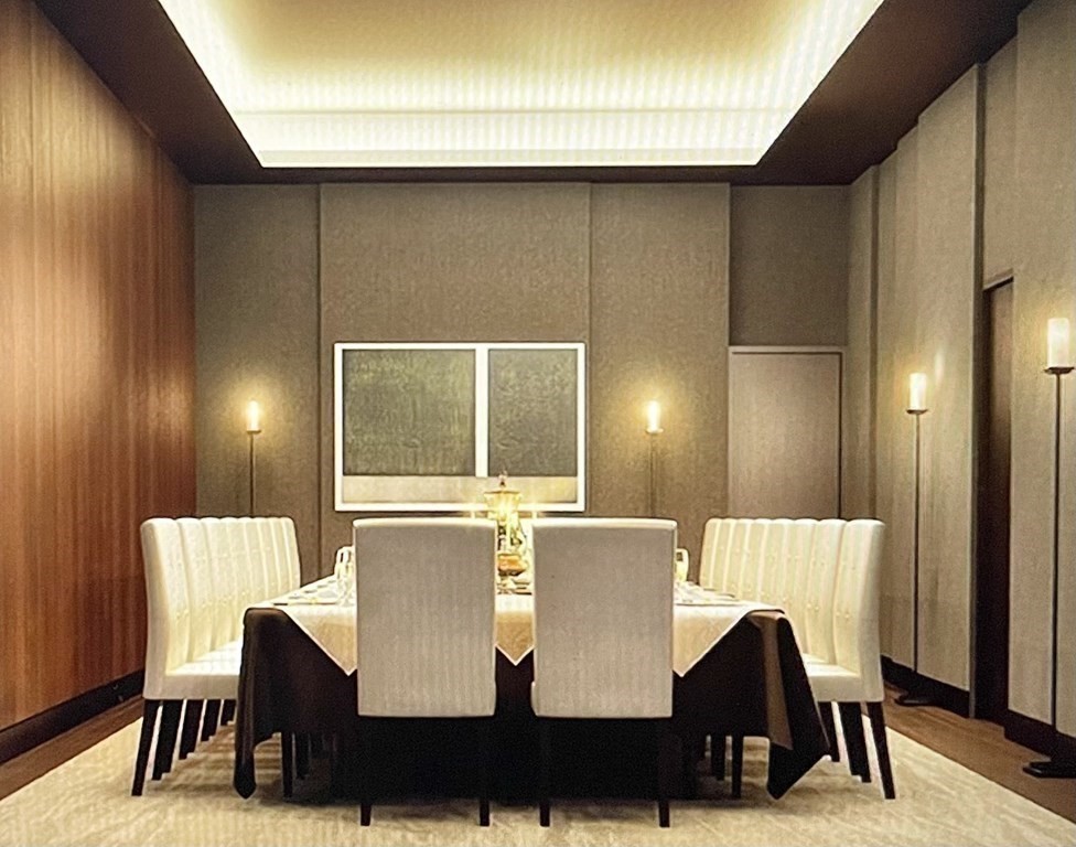 1 Franklin Street, Unit 4204 Boston, MA 02110 - Photo 30 of 37 a view of a dining room with furniture and wooden floor