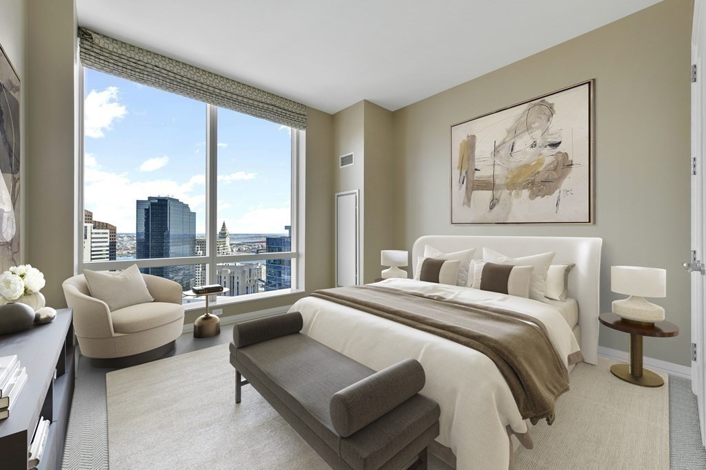 1 Franklin Street, Unit 4204 Boston, MA 02110 - Photo 8 of 37 a spacious bedroom with a bed and glass window
