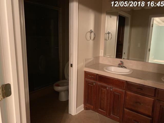 2770 Cooks Road Mount Juliet, TN 37122 - Photo 11 of 16 a bathroom with a sink and a mirror