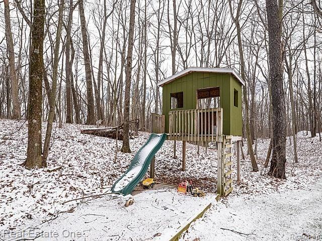 3352 Brighton Road Howell, MI 48843 - Photo 12 of 56 There's the kids' tree house, slide and sandbox!
