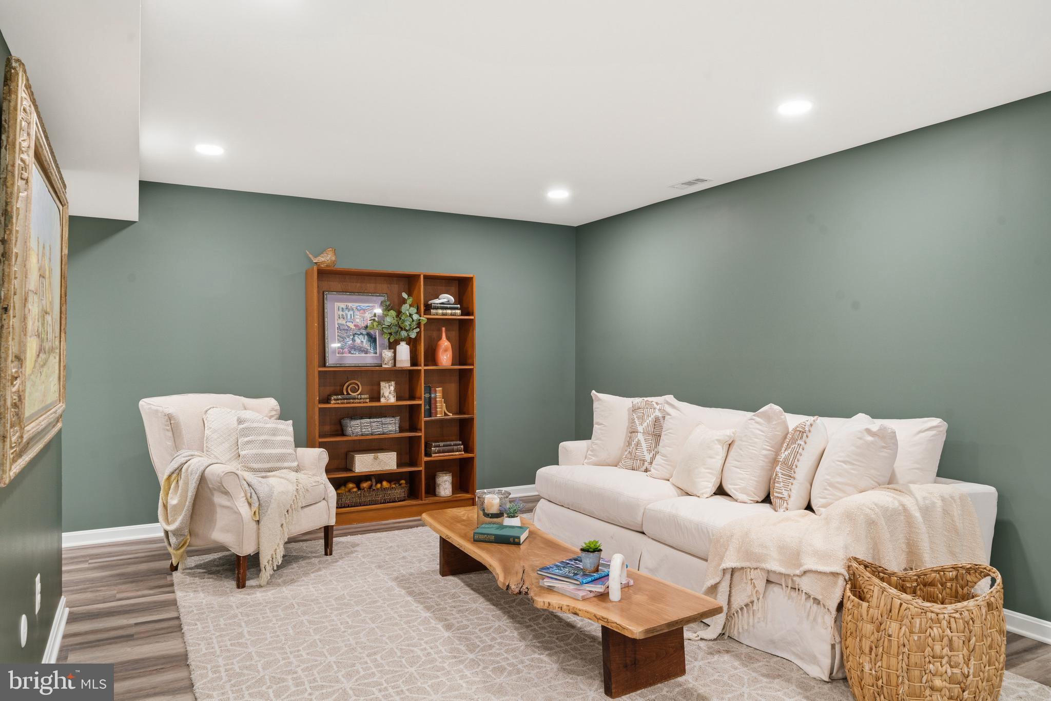 21031 Clarksburg Road Boyds, MD 20841 - Photo 37 of 79 Basement family room with LVP flooring