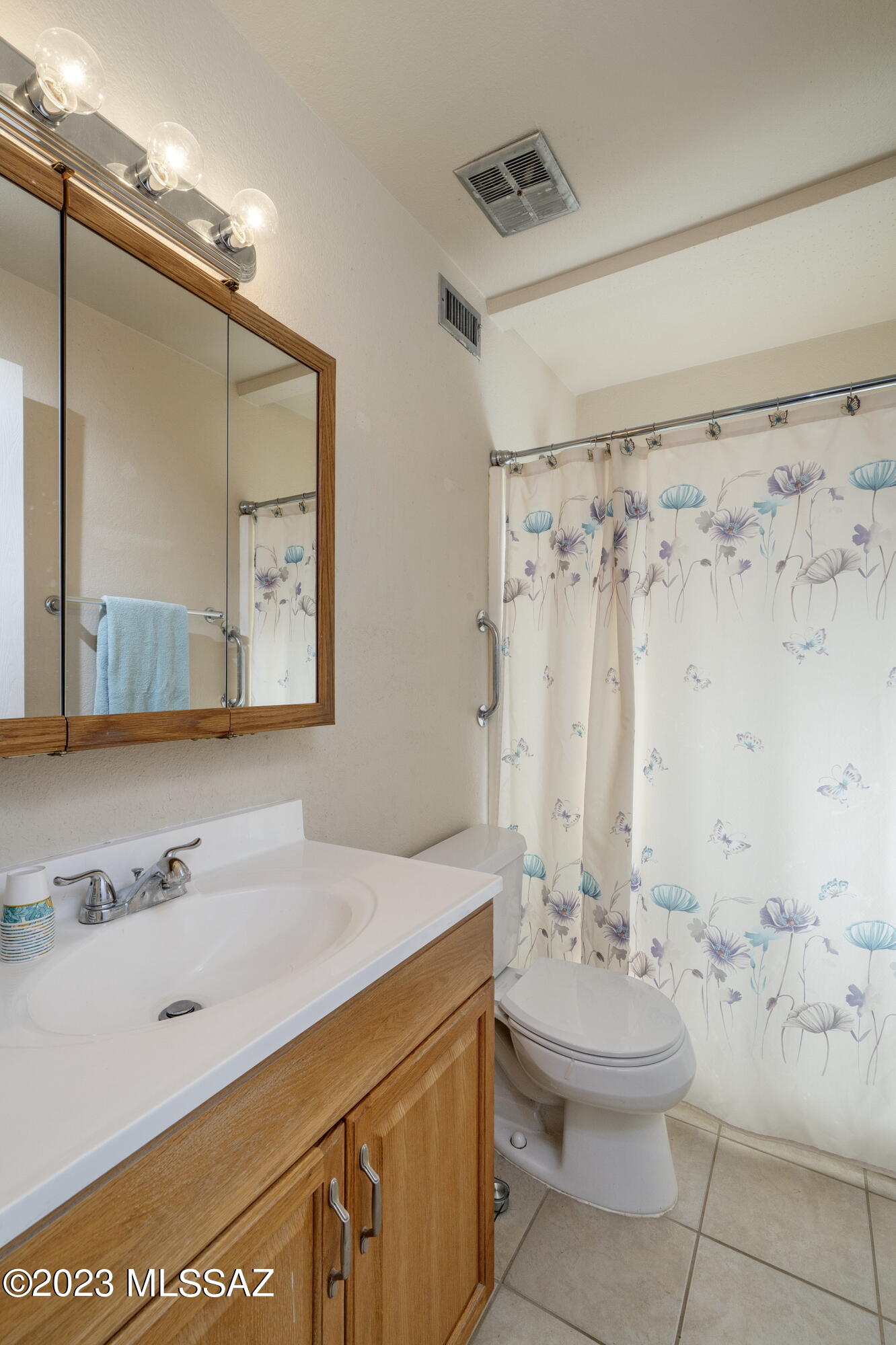 670 South Pantano Road, Unit E Tucson, AZ 85710 - Photo 11 of 17 a bathroom with a sink and a mirror
