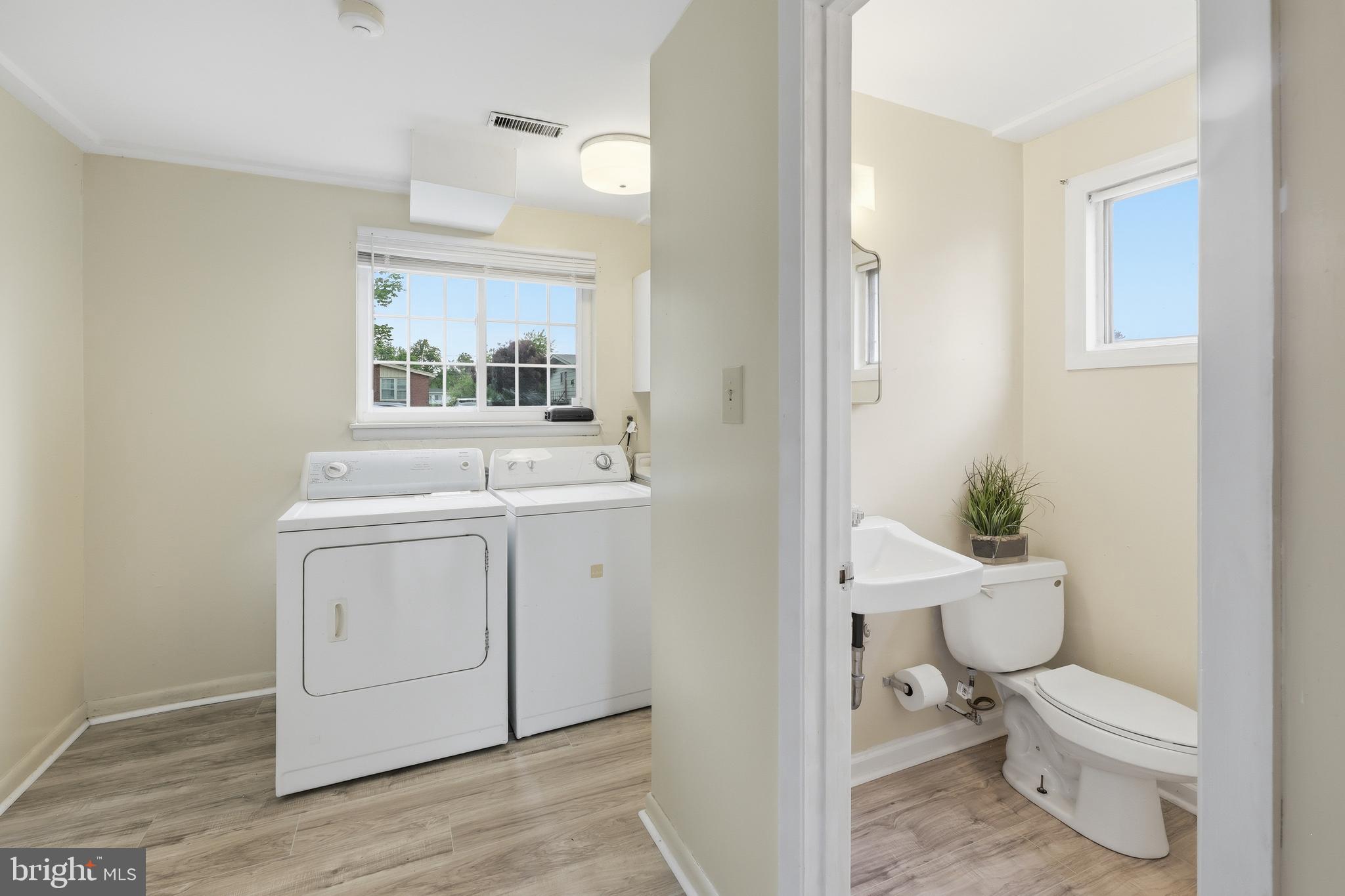 7434 Prince George Road Baltimore, MD 21208 - Photo 22 of 30 half bath and dedicated laundry room.