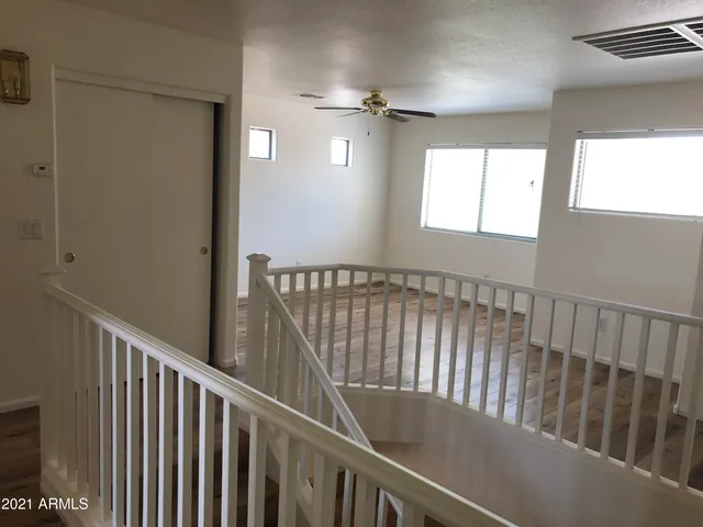 a view of small space with wooden floor