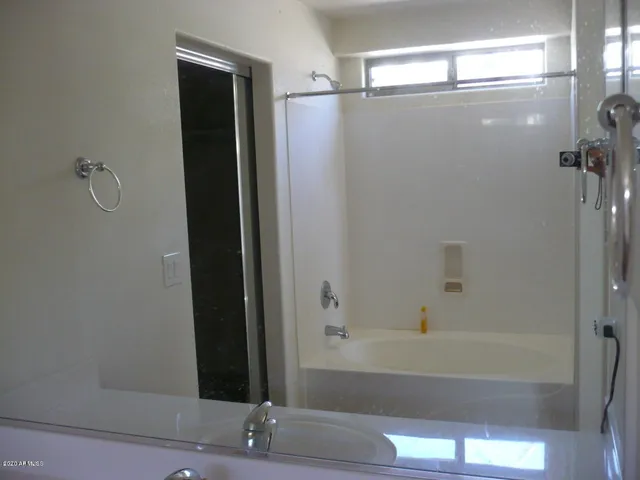 a view of wooden floor in an empty room