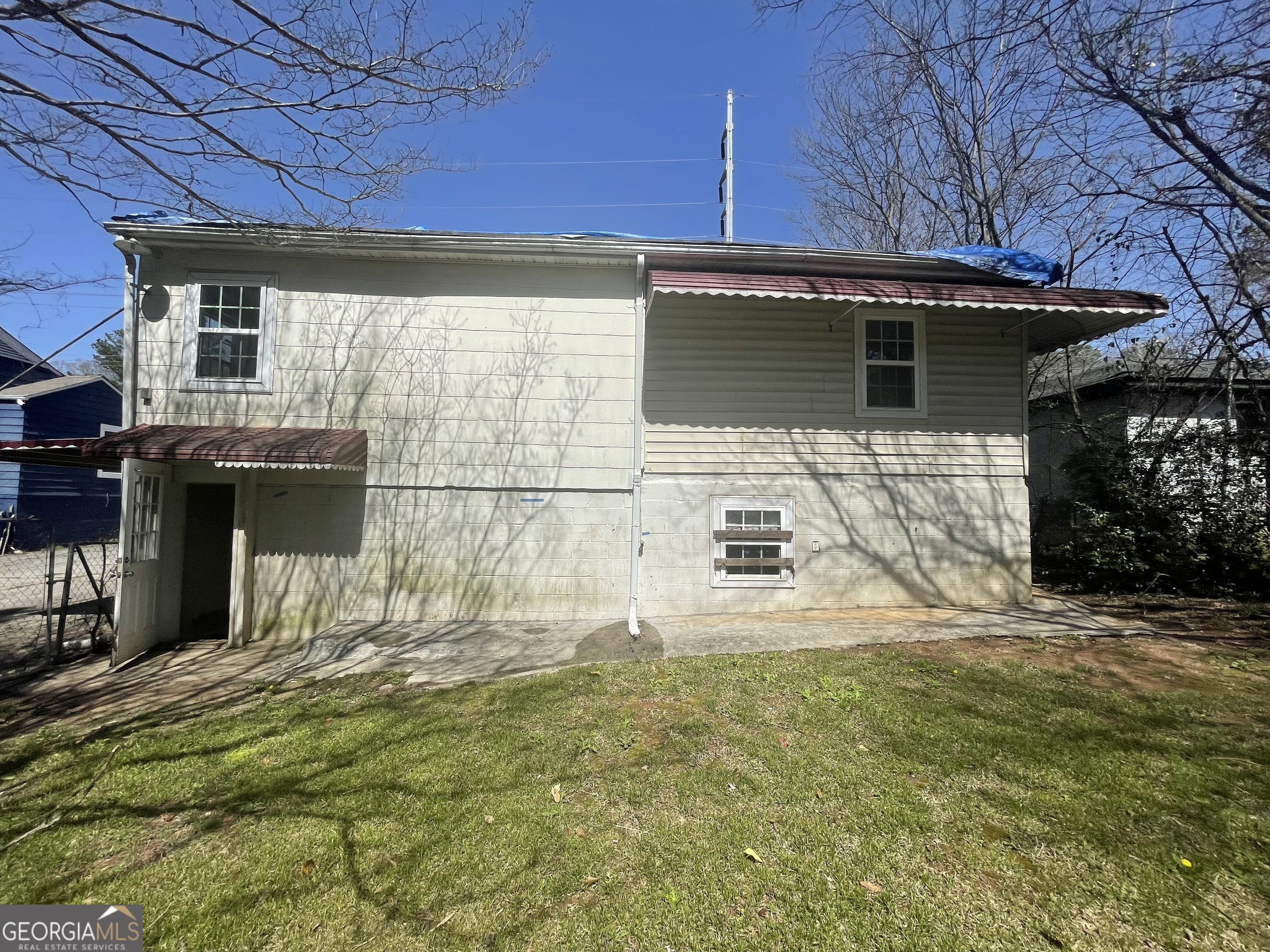 2066 Ben Hill Road East Point, GA 30344 - Photo 3 of 4 a view of a backyard with a small cabin