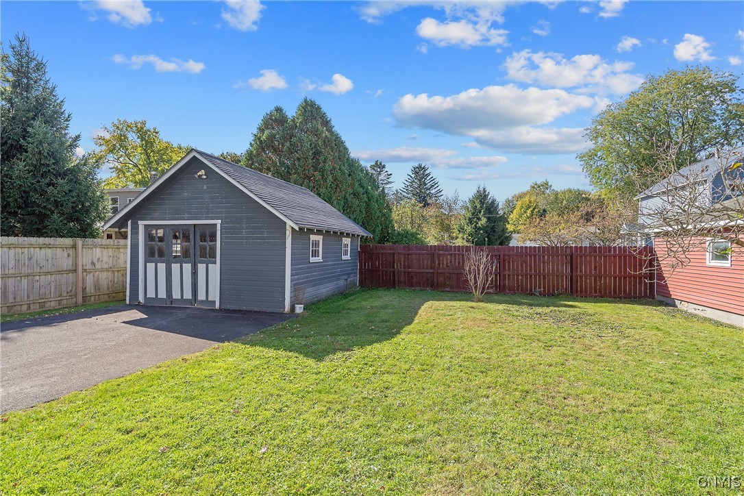 215 North Street Oneida, NY 13421 - Photo 33 of 36 The backyard is partially fenced and provides grea