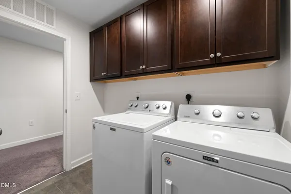 an empty room with a empty space and window