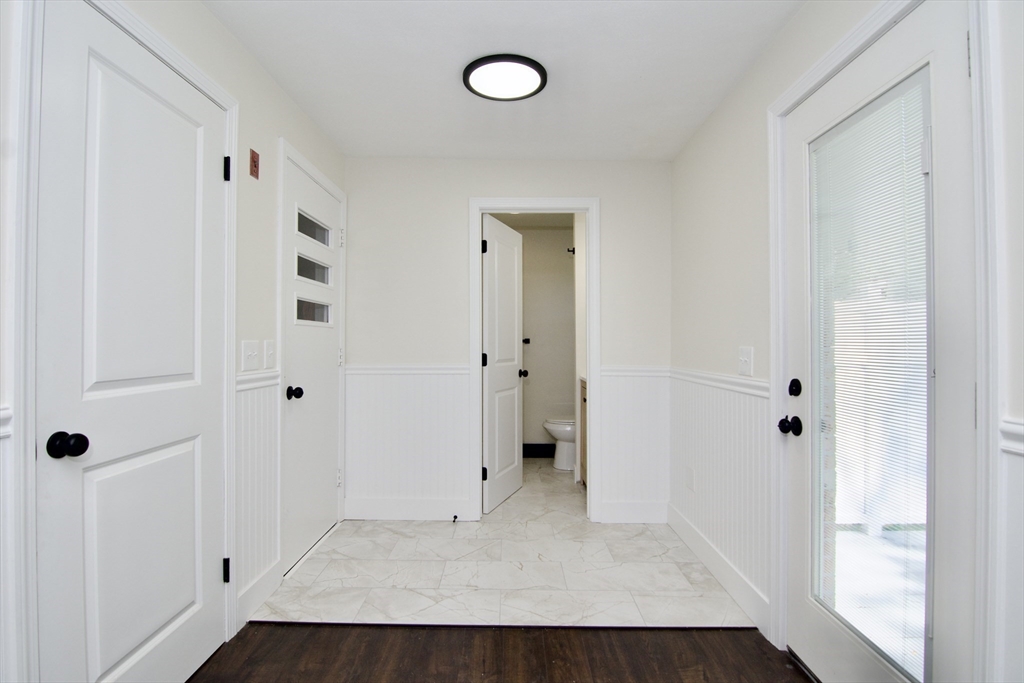 12 Dwight Street Hatfield, MA 01038 - Photo 17 of 42 an entryway at an empty room and wooden floor