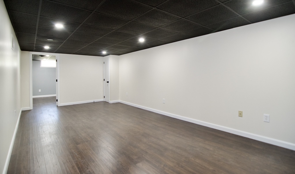 12 Dwight Street Hatfield, MA 01038 - Photo 30 of 42 an empty room with wooden floor and windows