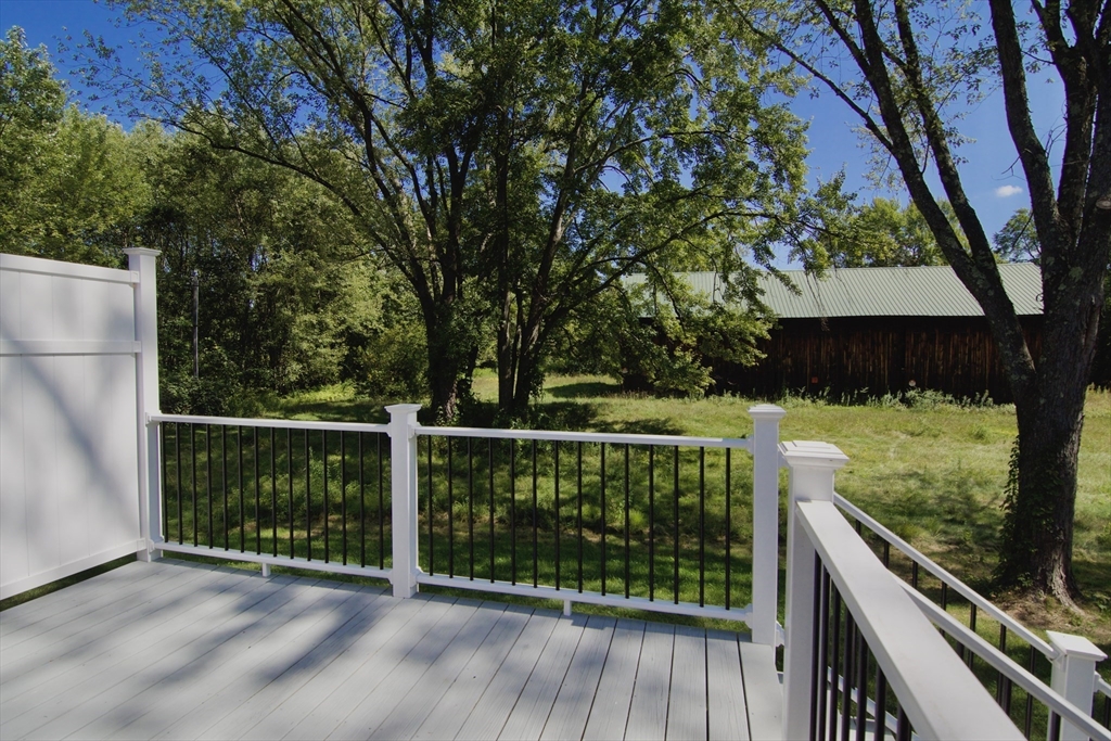 12 Dwight Street Hatfield, MA 01038 - Photo 4 of 42 a view of balcony with wooden floor and fence