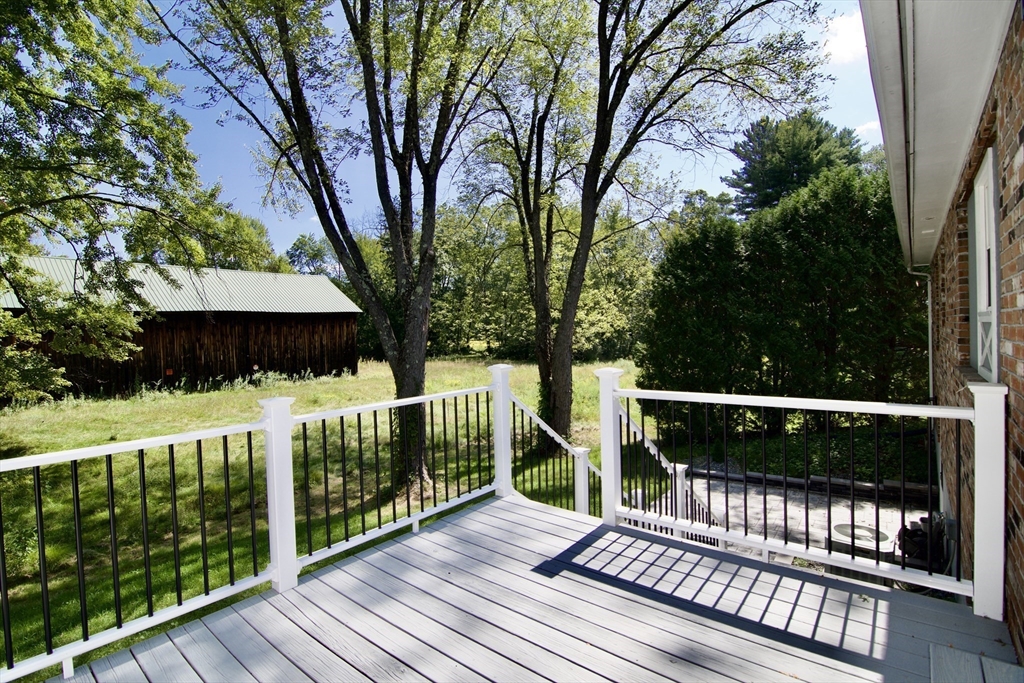 12 Dwight Street Hatfield, MA 01038 - Photo 5 of 42 a view of a wooden deck
