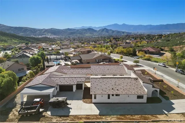 a view of a house with a mountain