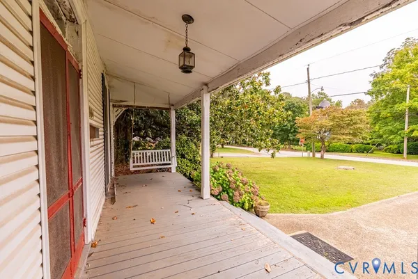 a view of a backyard with a large tree