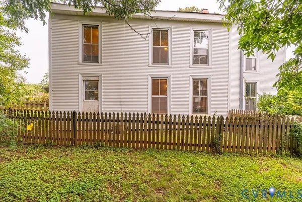 a view of backyard with green space