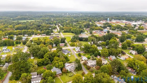 a front view of a house with yard